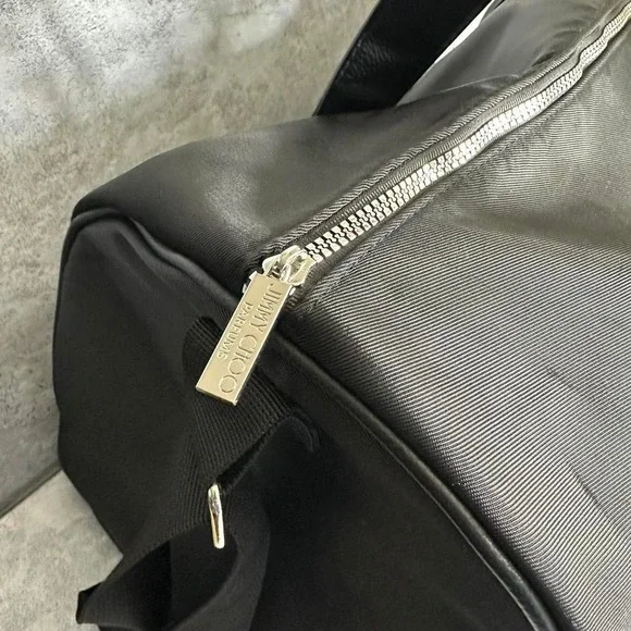 Jimmy Choo Weekend Bag, 18"L X 10"H X 10"D Adjustable Black crossbody Dufflebag - Picture 3 of 5